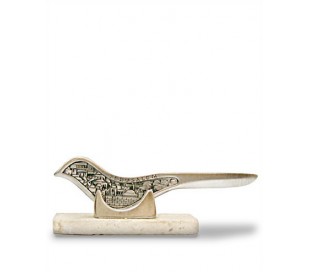 Dove letter opener on natural stone stand